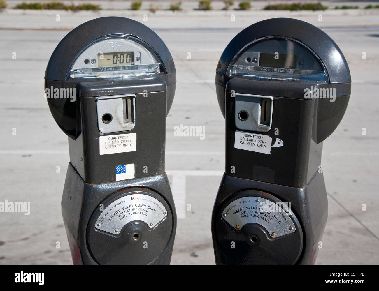 Two parking meters at long beach hires stock photography and images