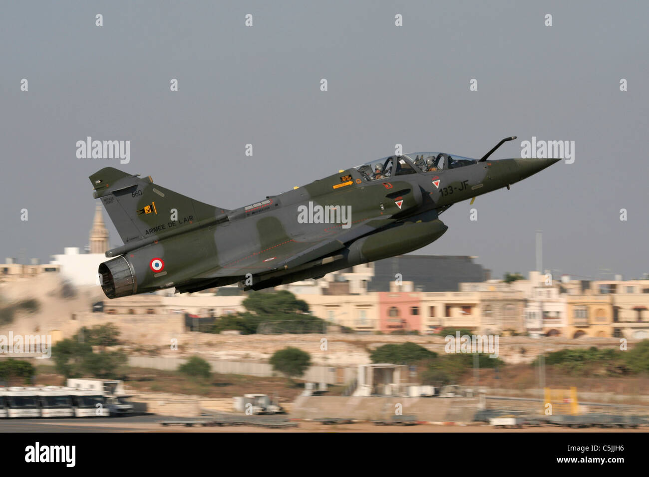 Military aviation. French Air Force Mirage 2000D combat jet taking off from Malta after an emergency landing during operations over Libya, July 2011 Stock Photo