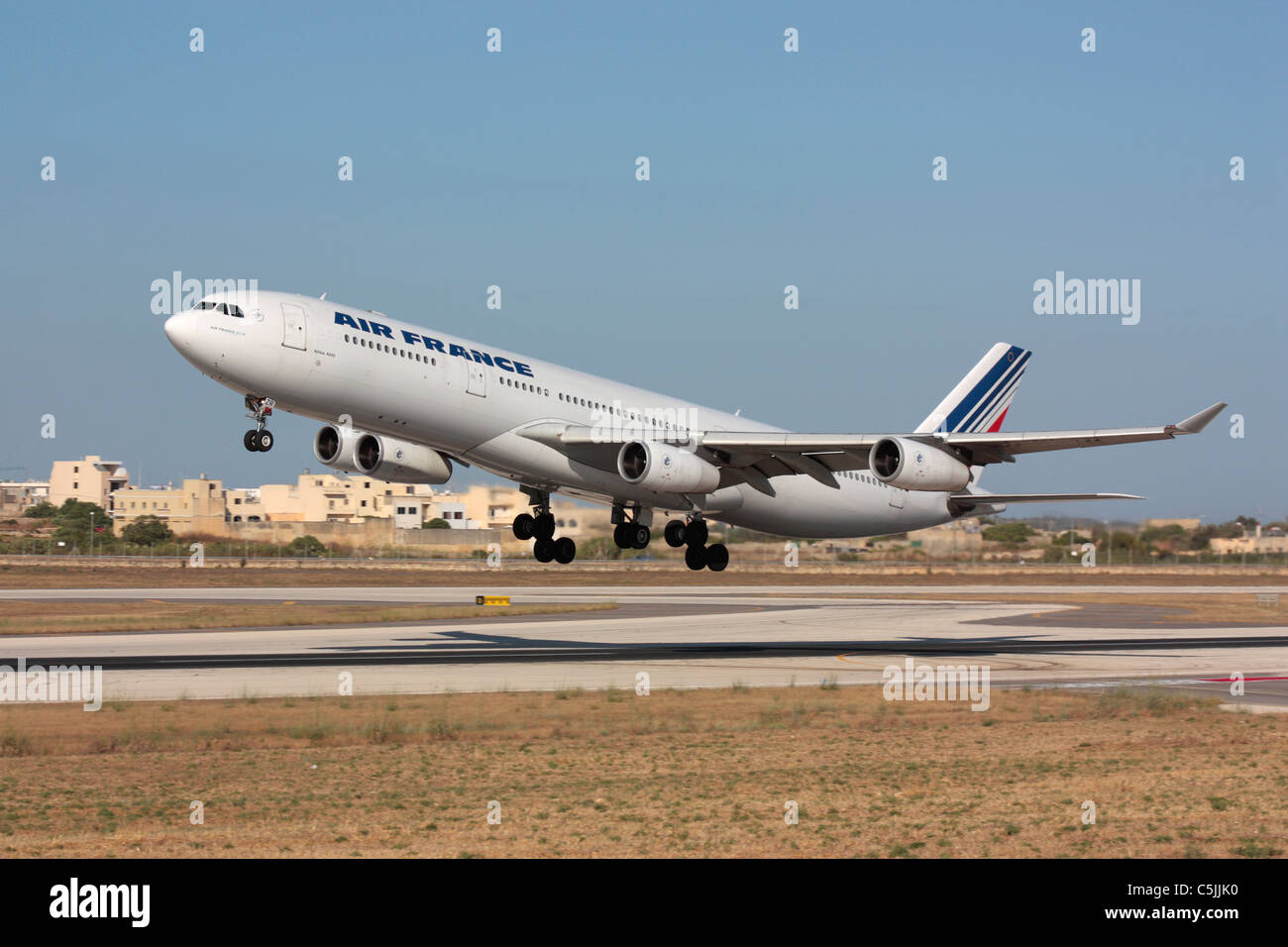 Air France Airbus A340-300 long haul widebody passenger jet plane taking off on a flight from Malta International Airport Stock Photo
