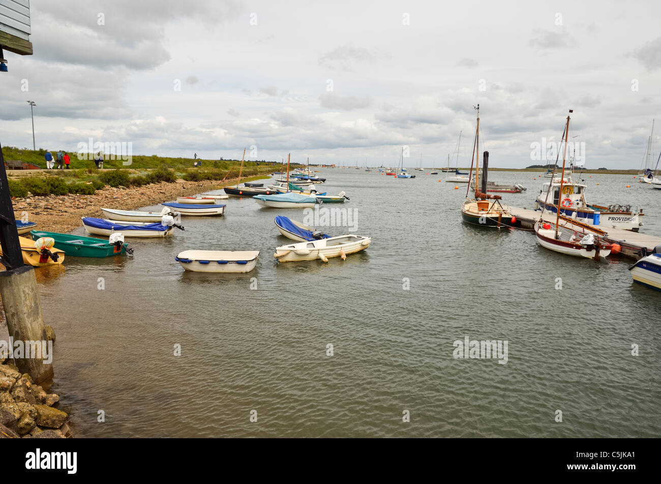 Wells next the Sea Harbour and jetty with Boats and Sea Wall Stock ...