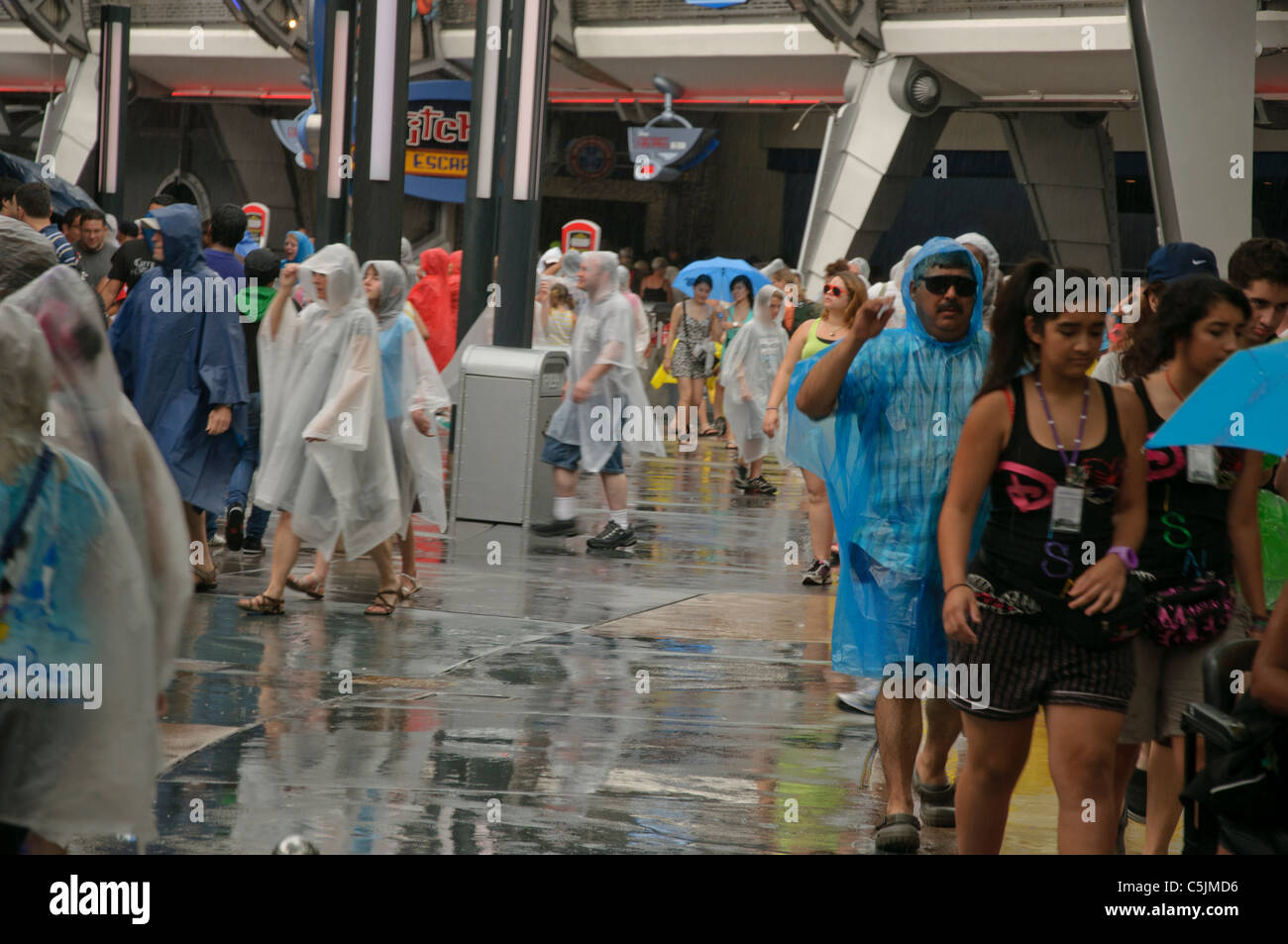 Magic Kingdom Walt Disney World Florida, raining torrential rain, everyone wearing ponchos Stock