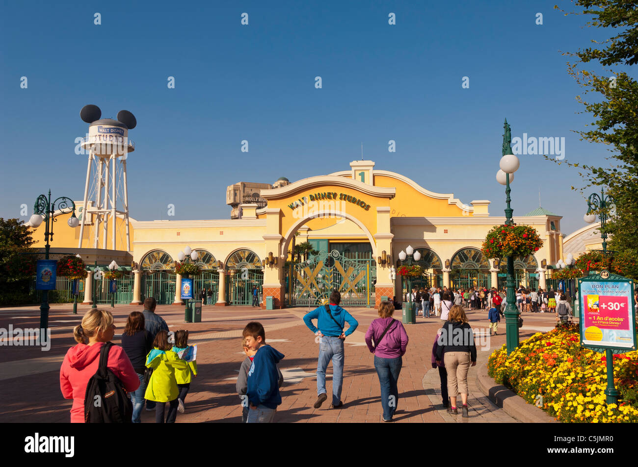 People on their way to the Walt Disney Studios park at Disneyland Paris in France Stock Photo