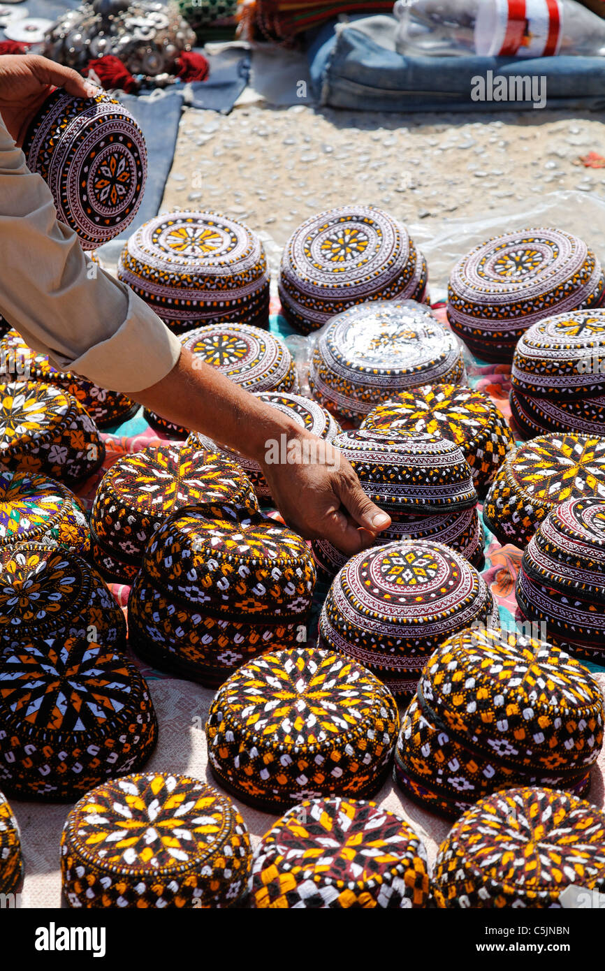 Turkmenistan - Ashgabat - Sunday market stall selling traditional hats Stock Photo