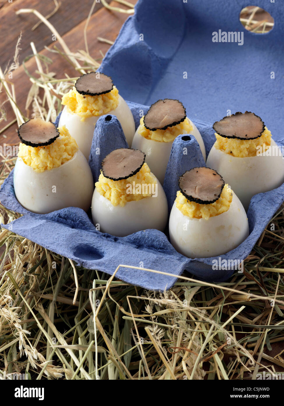 Truffled scrambled duck eggs in a carton Stock Photo Alamy