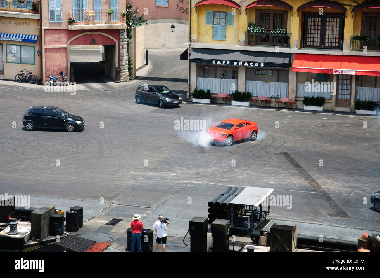 Action sequence stunt car motorbike show with explosions, jumps and crashes from Hollywood Studios Walt Disney World Florida Stock Photo