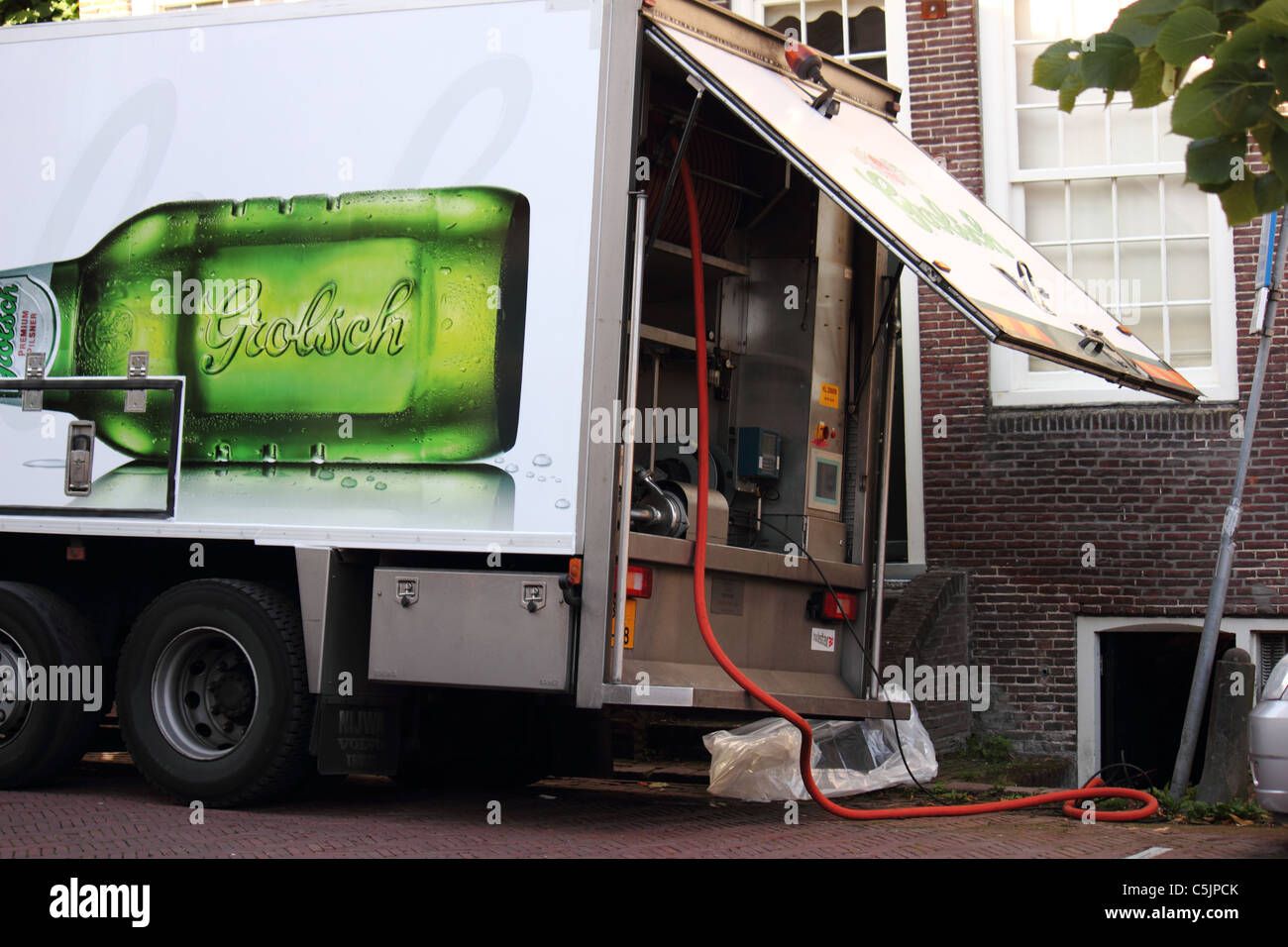 A Grolsch beer truck delivering beer in The Netherlands Stock Photo