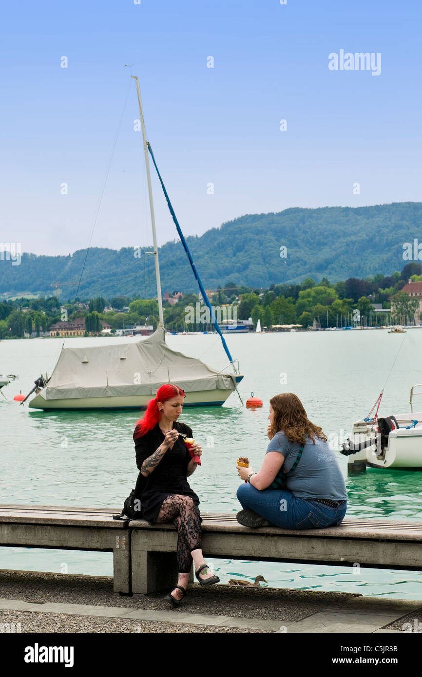 Girl with dyed red hair with friend, Zurich, Switzerland Stock Photo