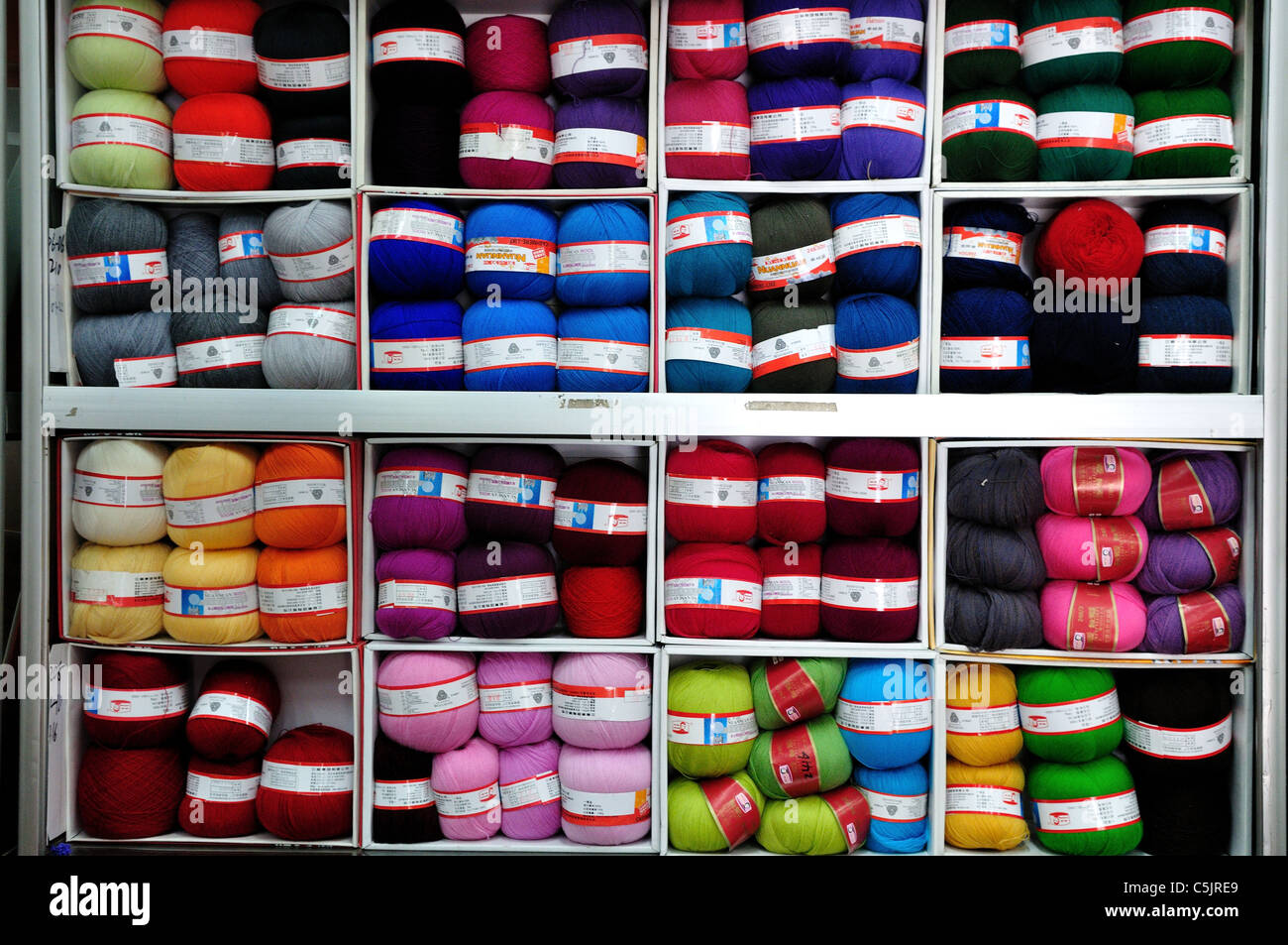 Rolls of yarn on a store shelf Stock Photo Alamy