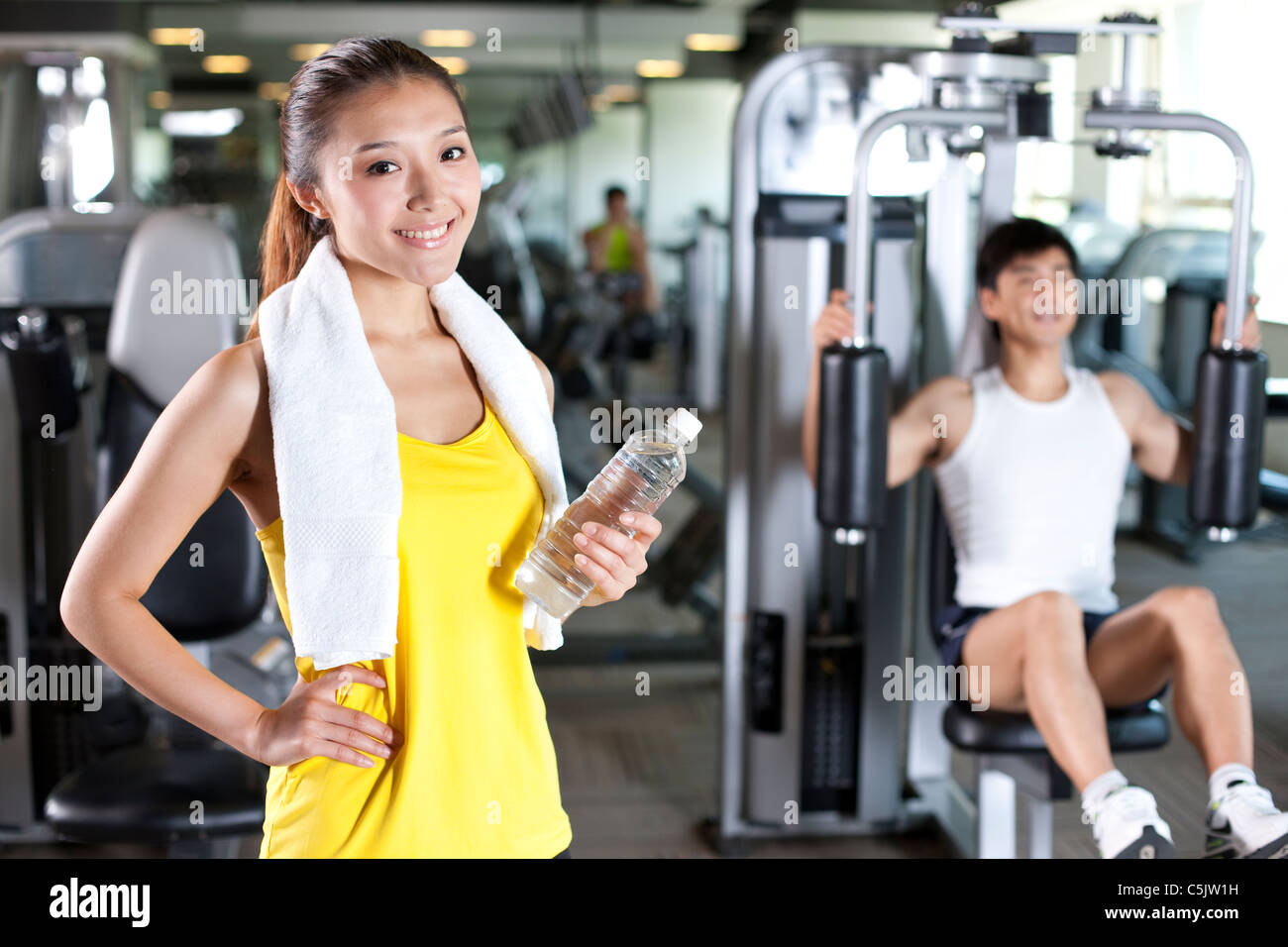 Young Man and Woman at Gym Stock Photo - Alamy