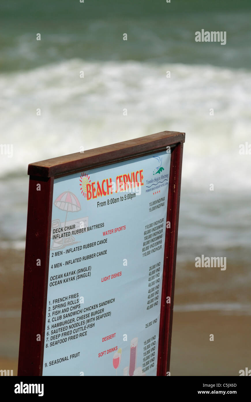 Asia, Vietnam, Nha Trang. Advertising 'Beach Service' at Nha Trang's beach promenade Tran Phu. Stock Photo