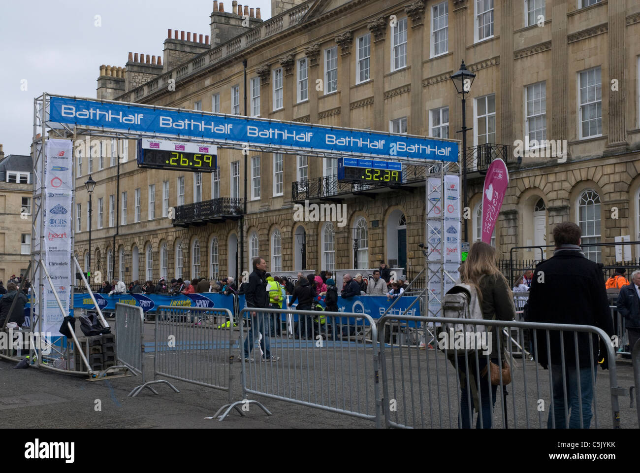 Waiting for the winner at the finish line of the Bath half marathon Bath Somerset UK Stock Photo ...