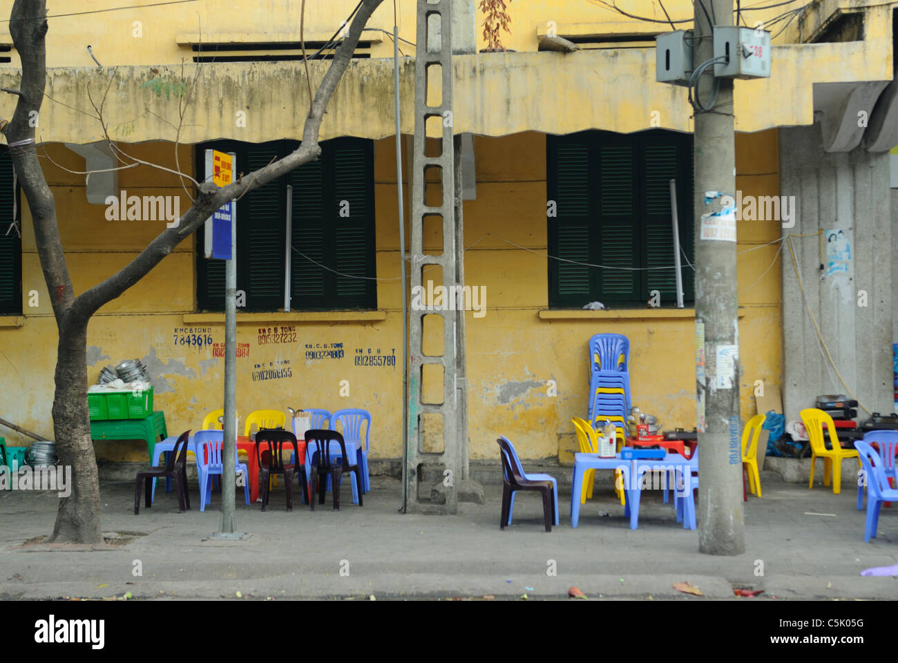 Asia, Vietnam, Hanoi. Hanoi old quarter. Colourful plastic chairs at a