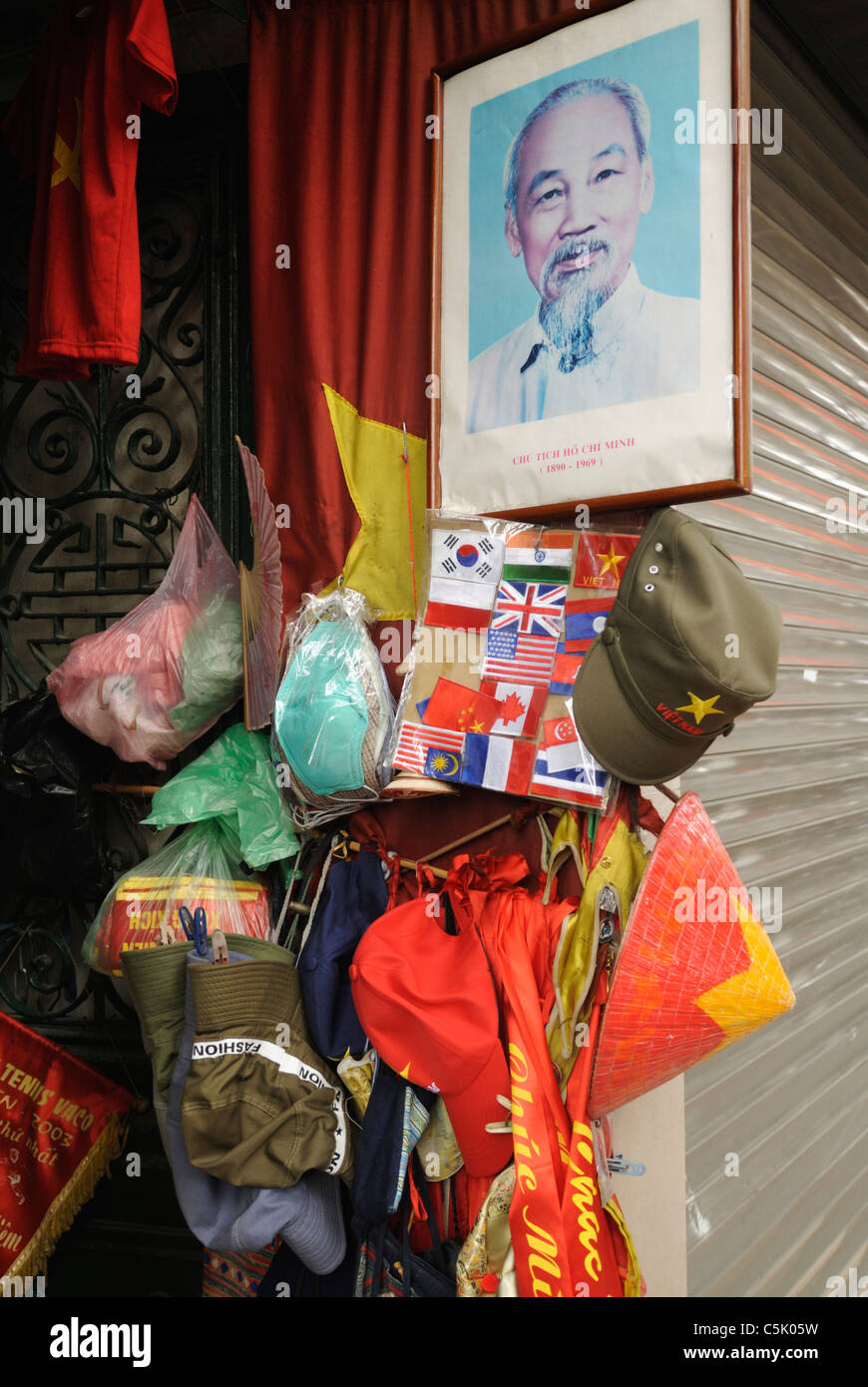 Asia, Vietnam, Hanoi. Shop with framed Ho Chi Minh portrait. Stock Photo