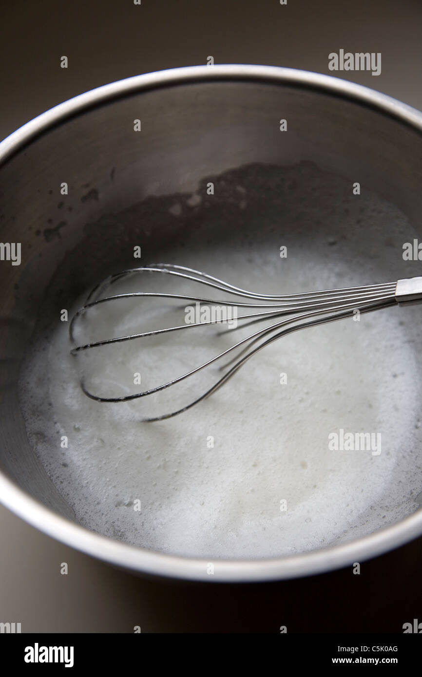 Whisking egg whites Stock Photo Alamy