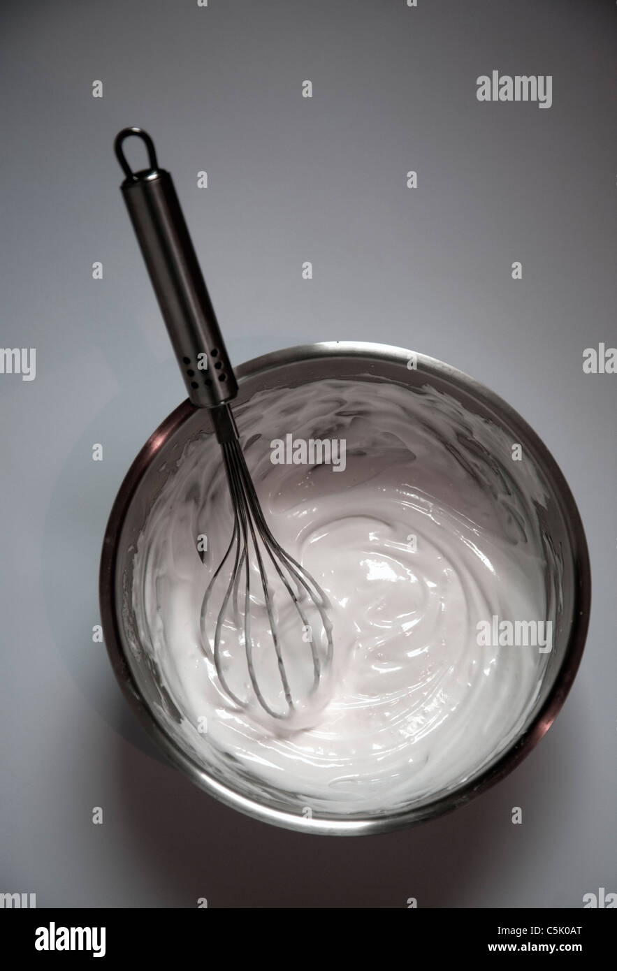 Whisking egg whites Stock Photo Alamy