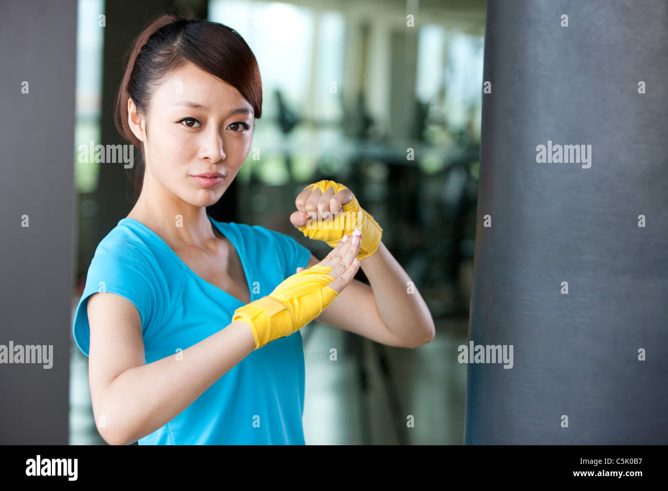 Confident woman standing gym hi-res stock photography and images - Alamy