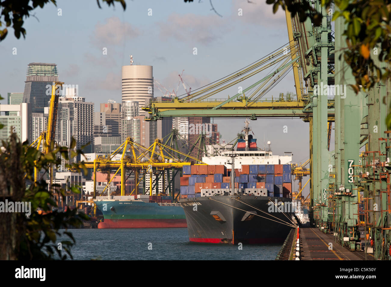 A container ship is loaded at the Brani Terminal in the port of