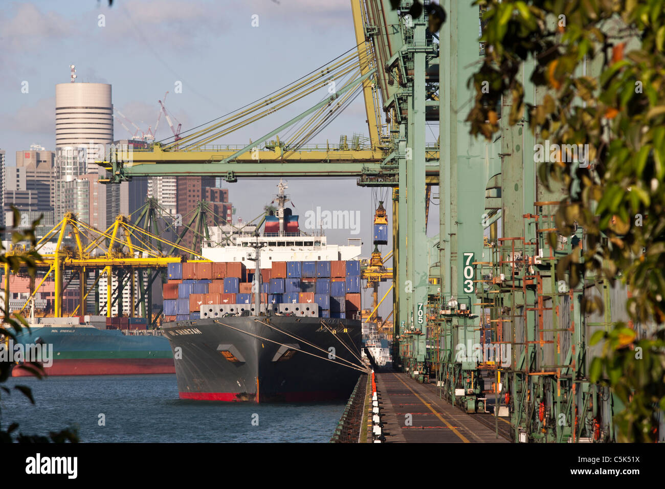 A container ship is loaded at the Brani Terminal in the port of