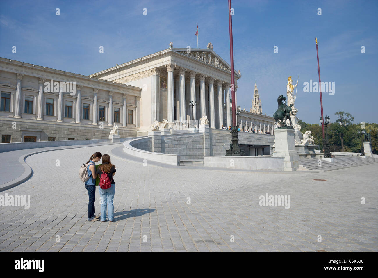 Two female tourists at the Austrian Parliament, Vienna, Austria Stock Photo