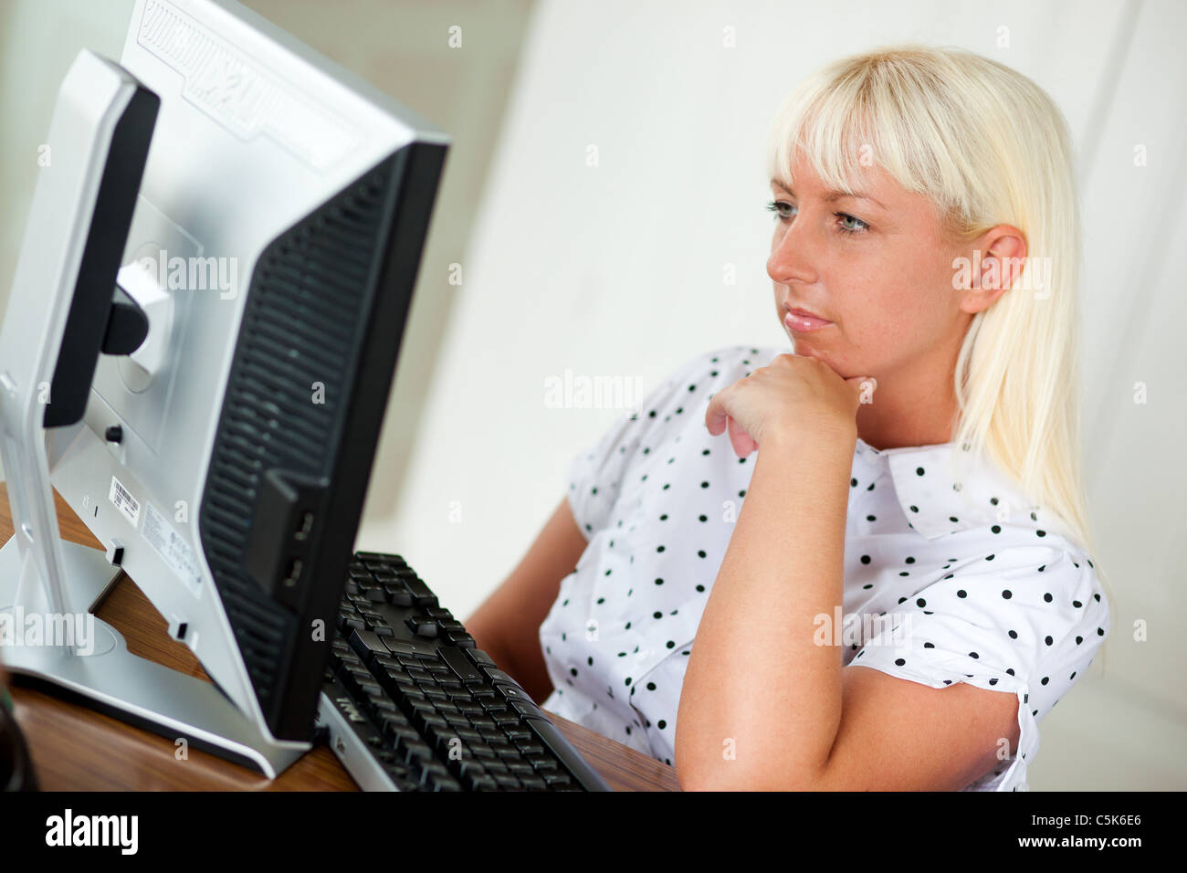 Portrait of woman in office Stock Photo