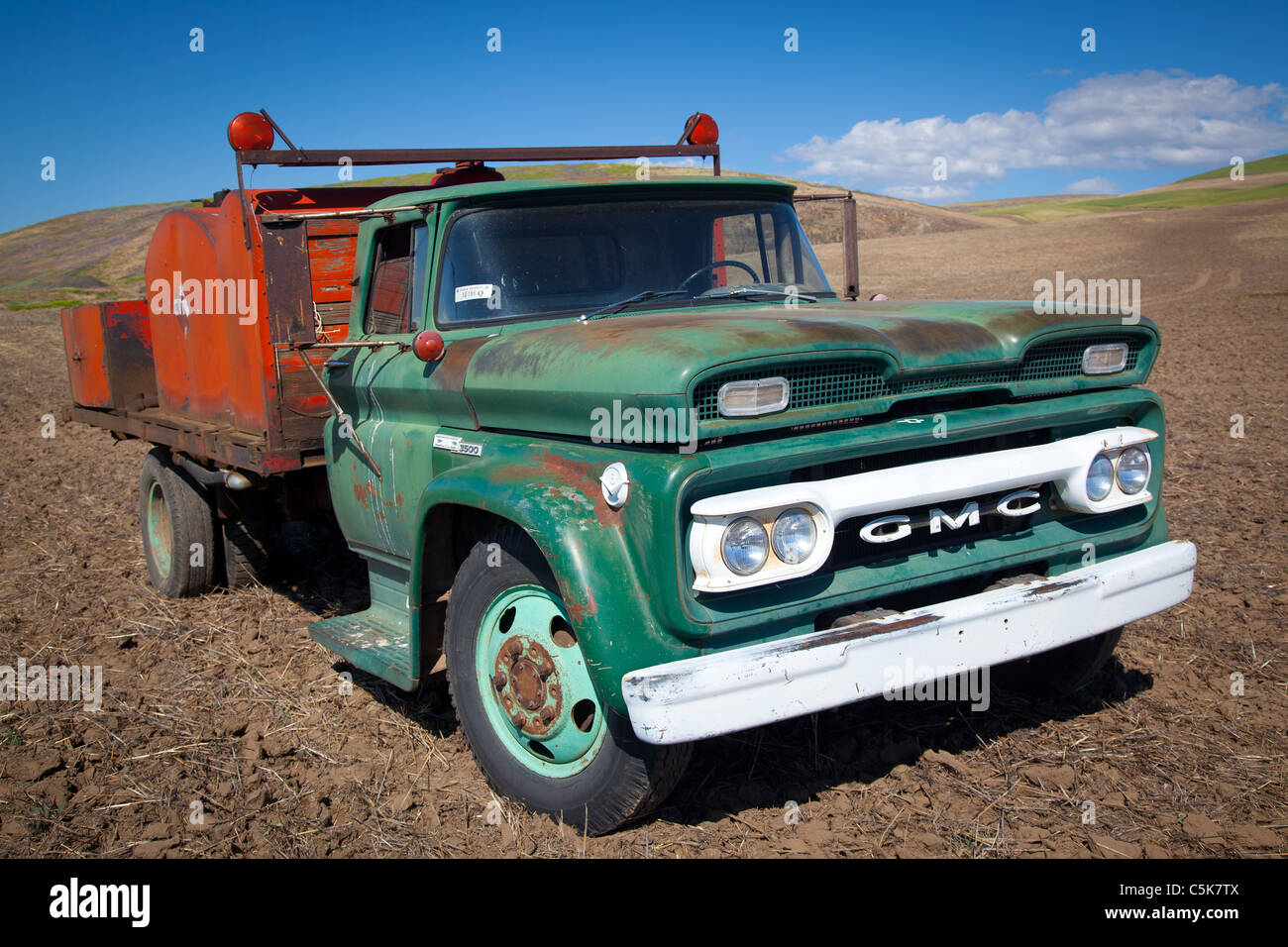 Old truck in Palouse farm field Stock Photo