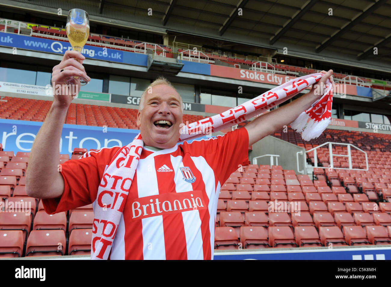 Stoke City football fan Gerald Blairs celebrates his £2,405,435 Lottery win Stock Photo