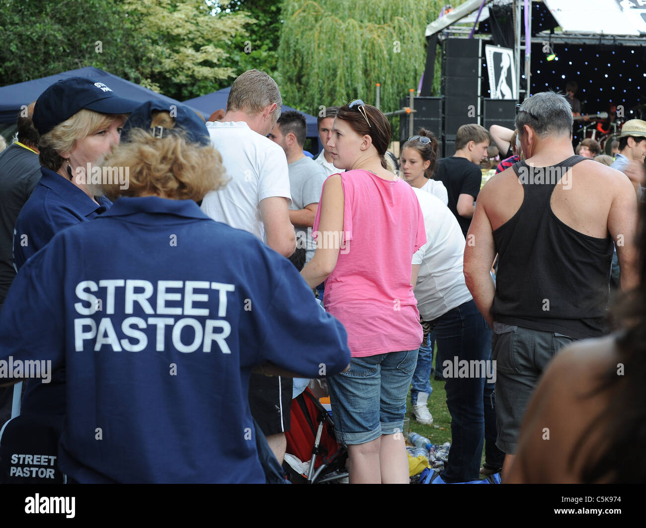 A street pastor at a music festival called Rock the Priory, in Ware, Hertfordshire. Stock Photo