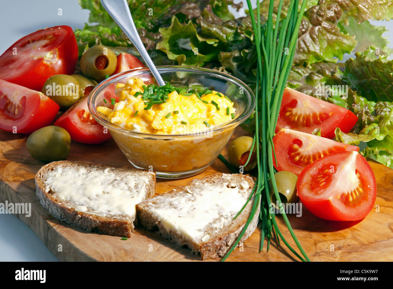 Breakfast plate with eggs and tomatoes Stock Photo