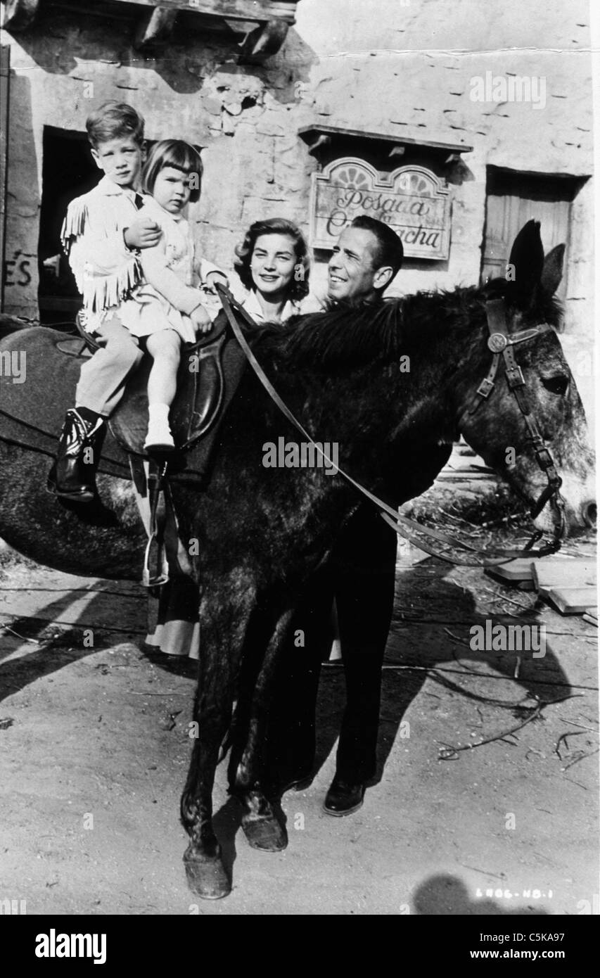 Humphrey Bogart, Lauren Bacall, Stephen and Leslie riding a mule. 1955 Stock Photo