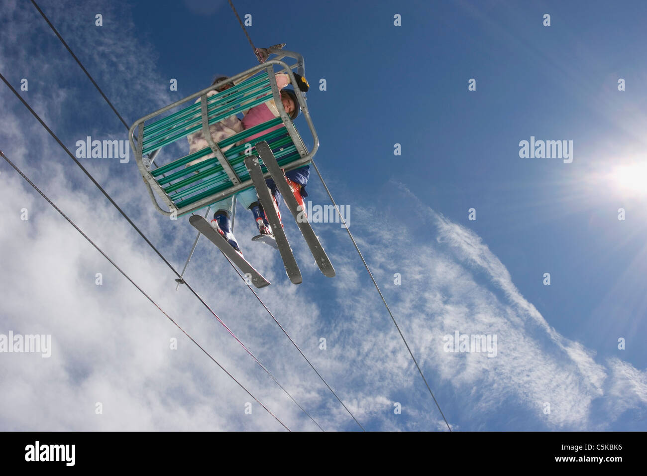 Skiers on chairlift, Taos Ski Valley, New Mexico Stock Photo
