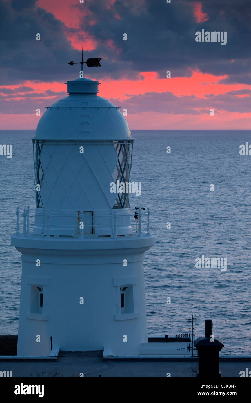 Pendeen Watch Lighthouse at sunset; Cornwall Stock Photo