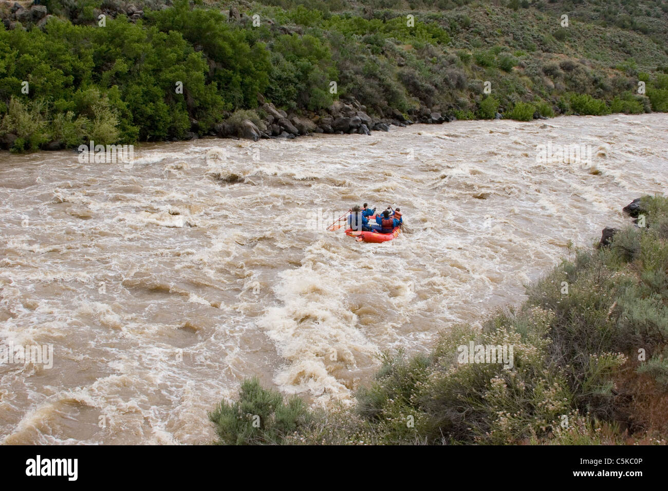 Wide shot of rafters on the Rio Grande River Stock Photo