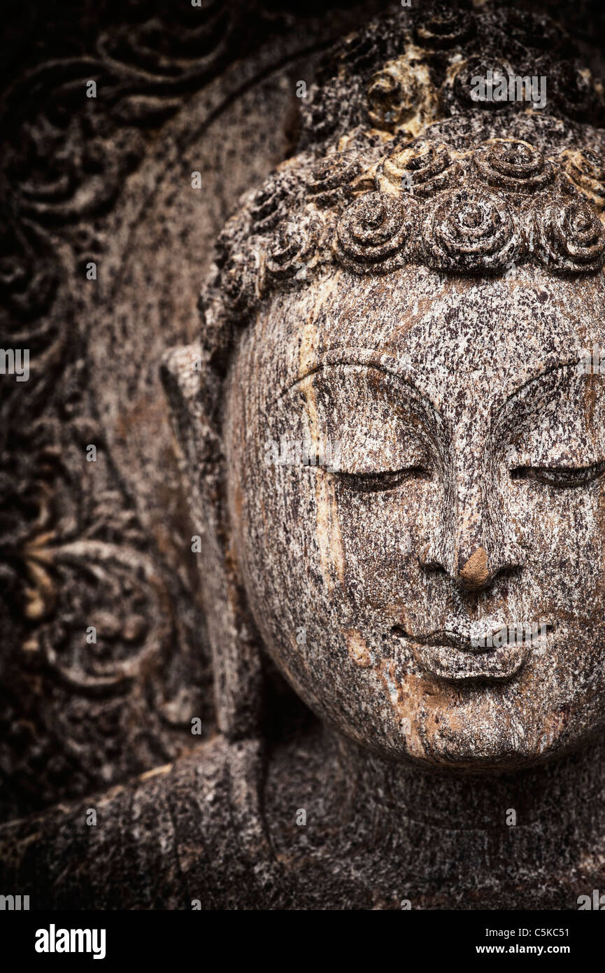 Stone Buddha face statue Stock Photo