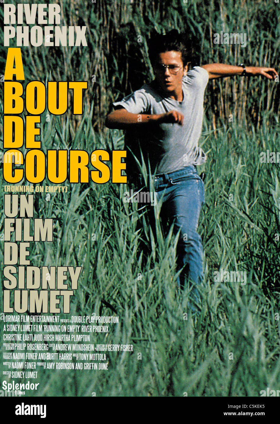 Running on Empty  Year : 1988 Director : Sidney Lumet  River Phoenix Movie poster (Fr) Stock Photo