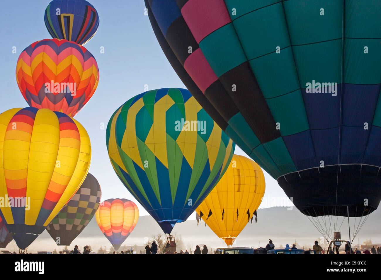 Group of hot air balloons ready to lift off in Taos NM. Stock Photo