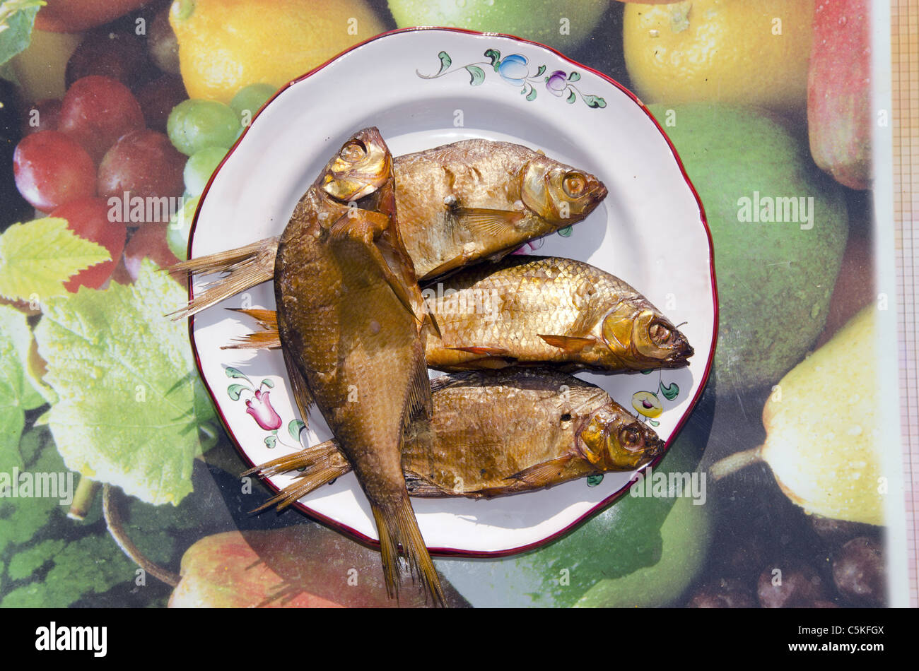 Freshly bloated fishes put in vessel. Food for gourmet. Stock Photo