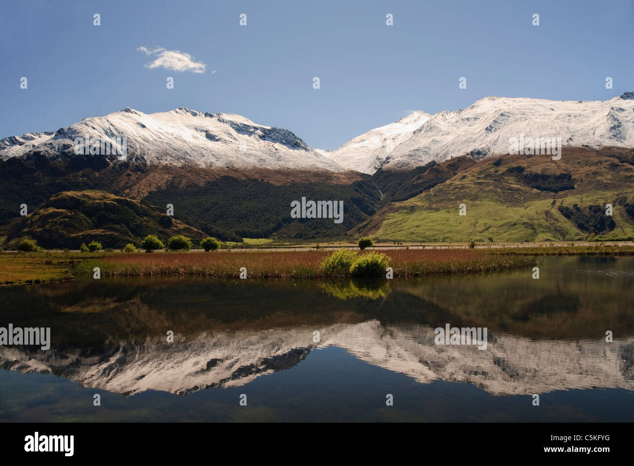 Snow covered mountain peak lake reflection, New Zealand Stock Photo