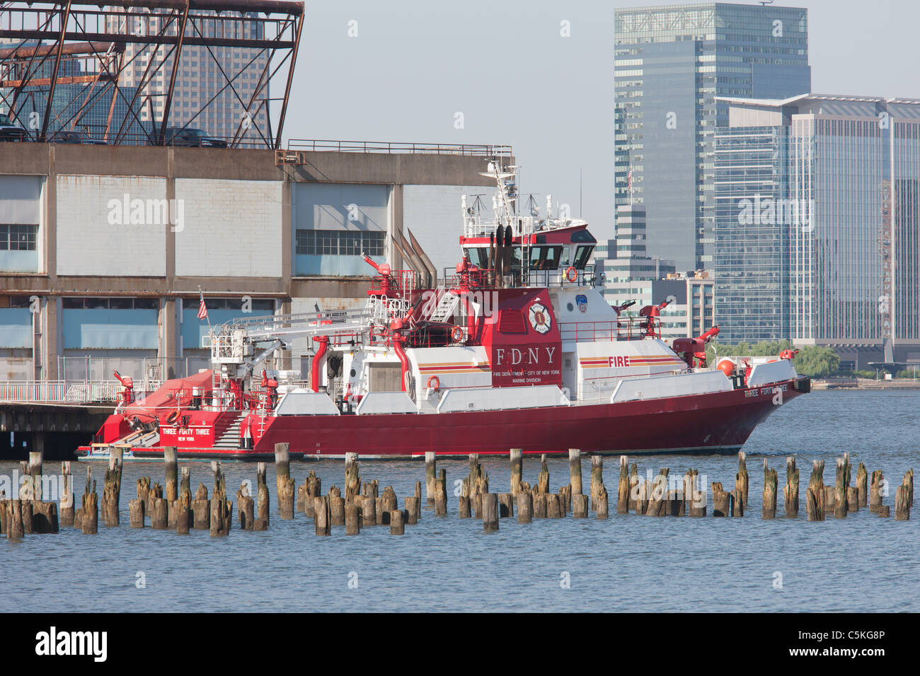 FDNY Marine 1 fire boat 'Three Forty Three' docked in its berth at Pier 40 on the Hudson River. Stock Photo