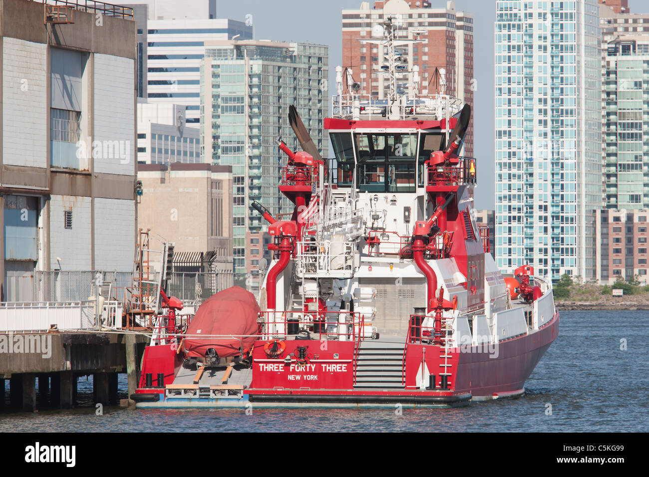FDNY Marine 1 fire boat 'Three Forty Three' docked in its berth at Pier 40 on the Hudson River. Stock Photo