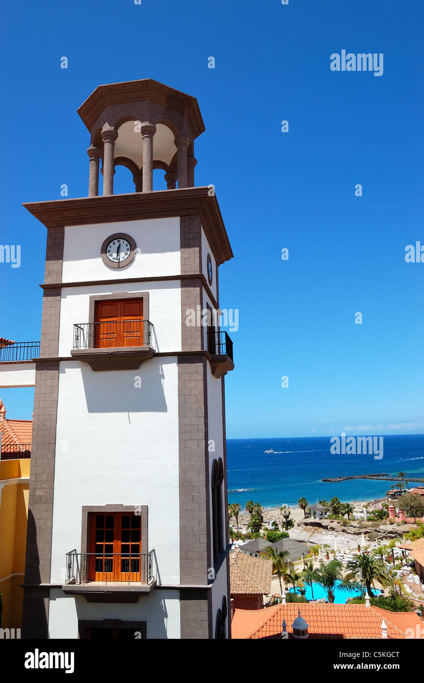 Tower with clock at the luxury hotel, Tenerife island, Spain Stock Photo