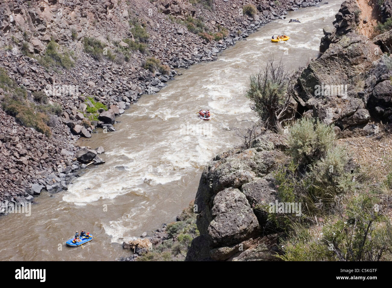 Three rafts on the Rio Grande River seen from above Stock Photo