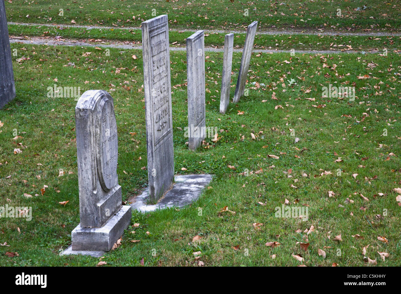 Headstones in cemetery in Fall. Stock Photo