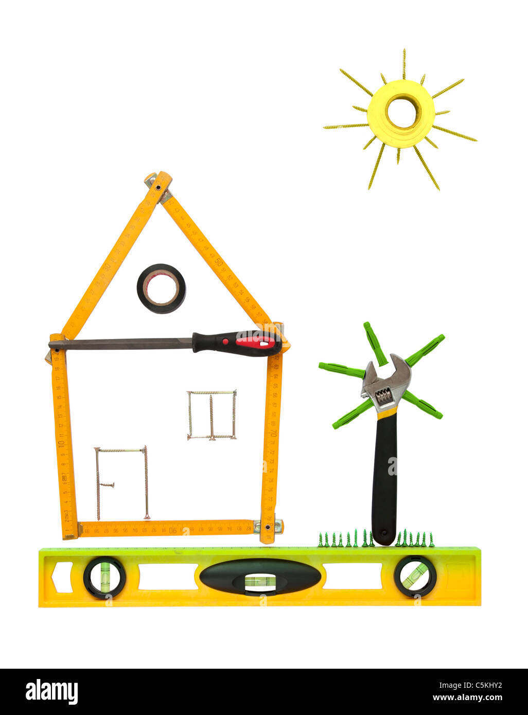 House with tree and sun made of tools for building.White isolated Stock Photo