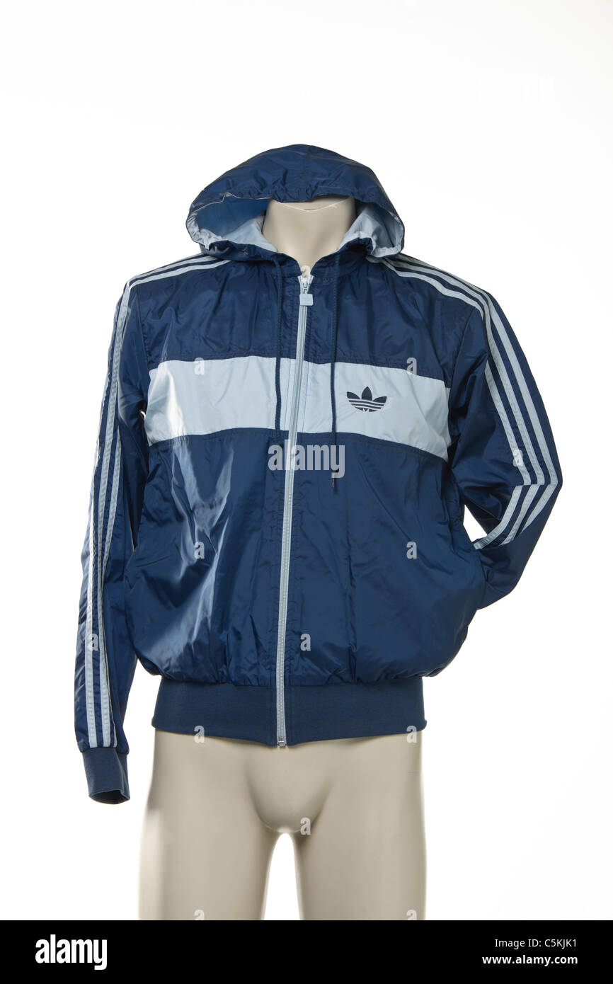 Adidas Marseille range sportswear windcheater men's rain jacket in two-tone  blue nylon, hooded full zip Stock Photo - Alamy