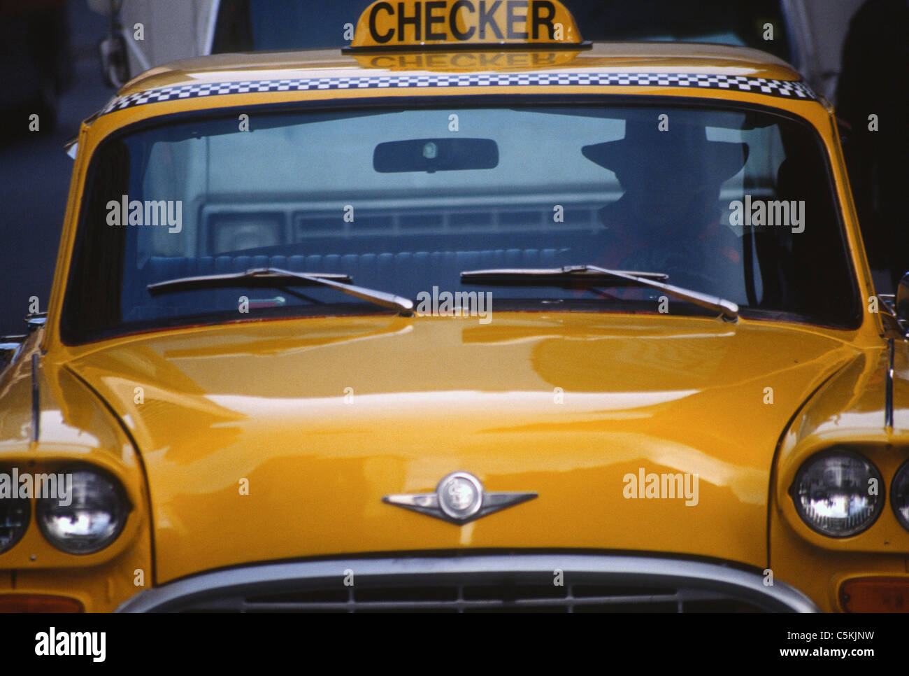 Checker cab on street, NYC Stock Photo