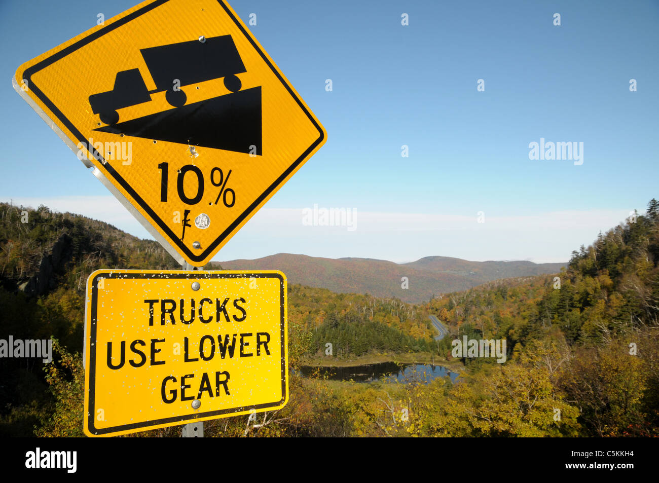 Motorist use their brakes as they travel down a steep road in Buels Gore, Vermont near the Appalachian Trail. Stock Photo