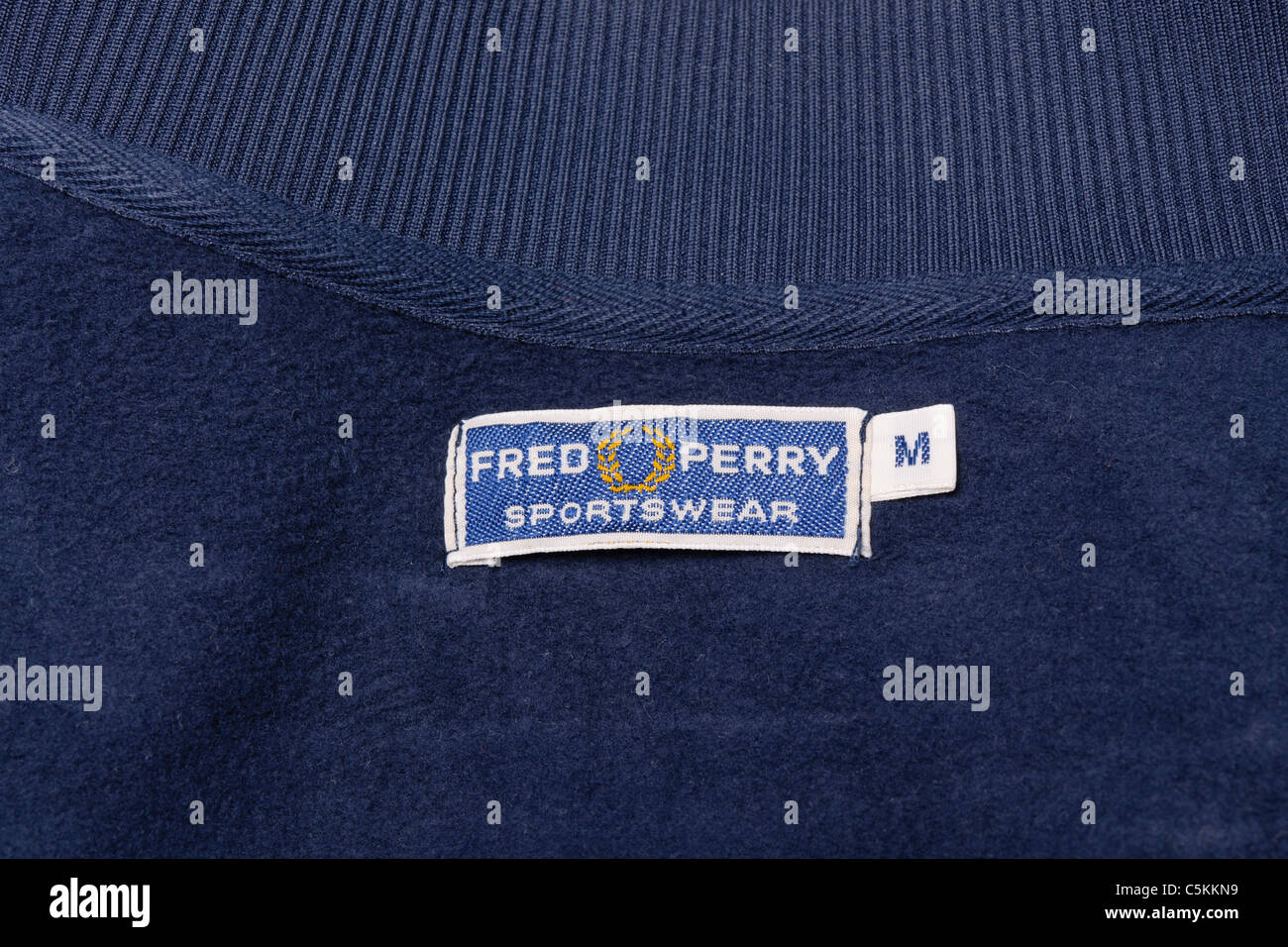 Fred Perry full zip men's track jacket track top in blue nylon. Label  detail Stock Photo - Alamy