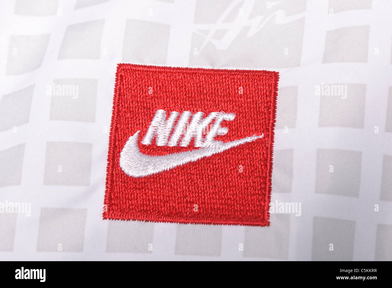 Nike Air windrunner sportswear men's nylon rain jacket full zip with hood. Nike logo detail Stock Photo