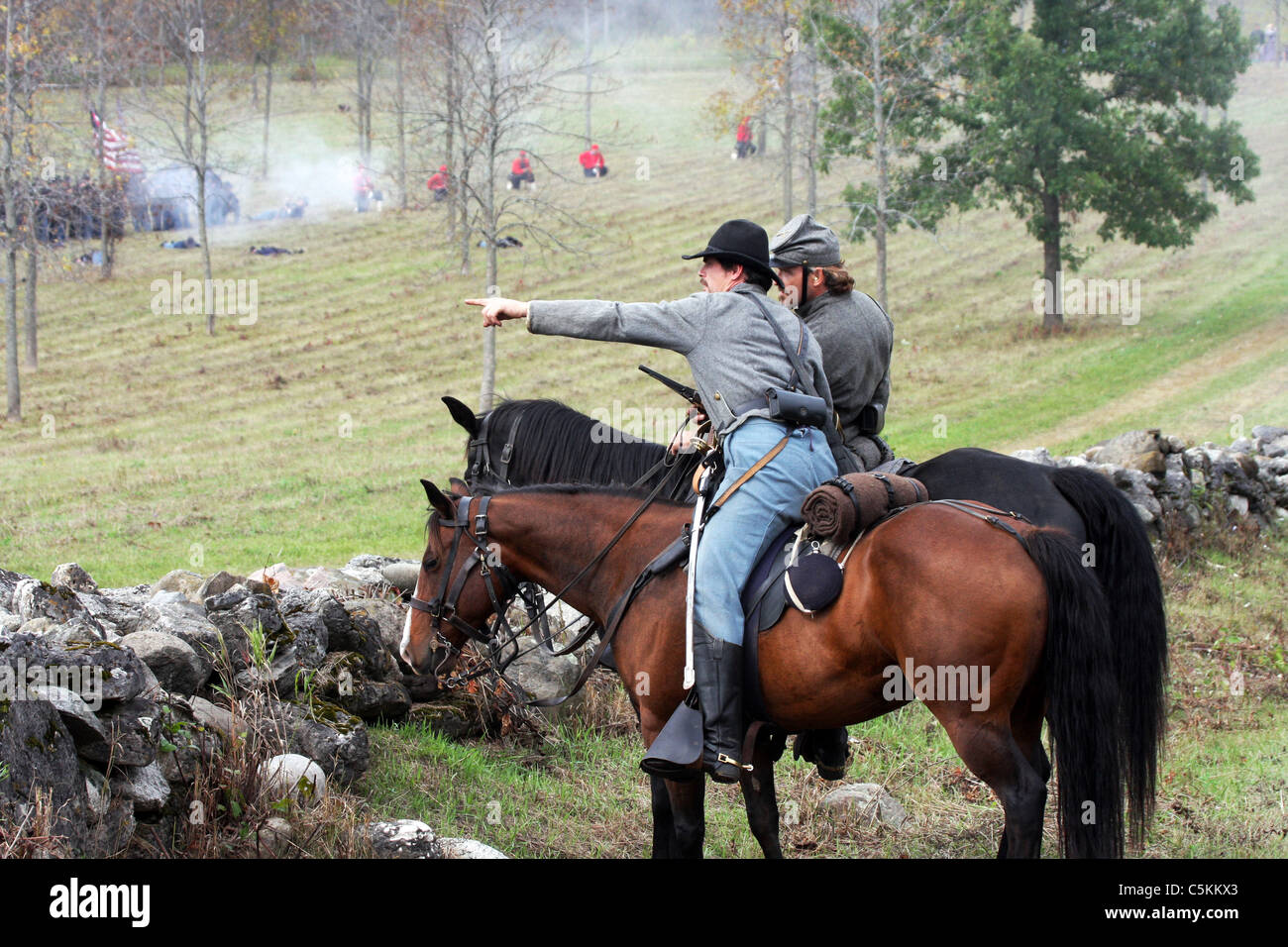 A Civil War Southern Soldiers On Horse Calvary Pointing At The Front 