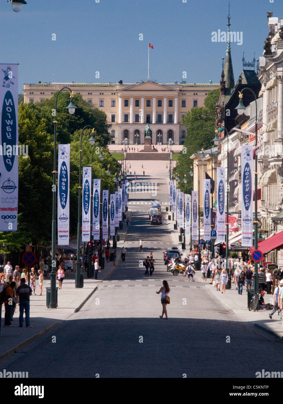 Royal Palace (Slottet) and Karl Johans Gate with banners for Norway Cup youth football (soccer) tournament, Oslo, Norway Stock Photo